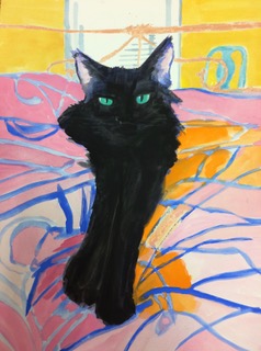 Black cat on bed